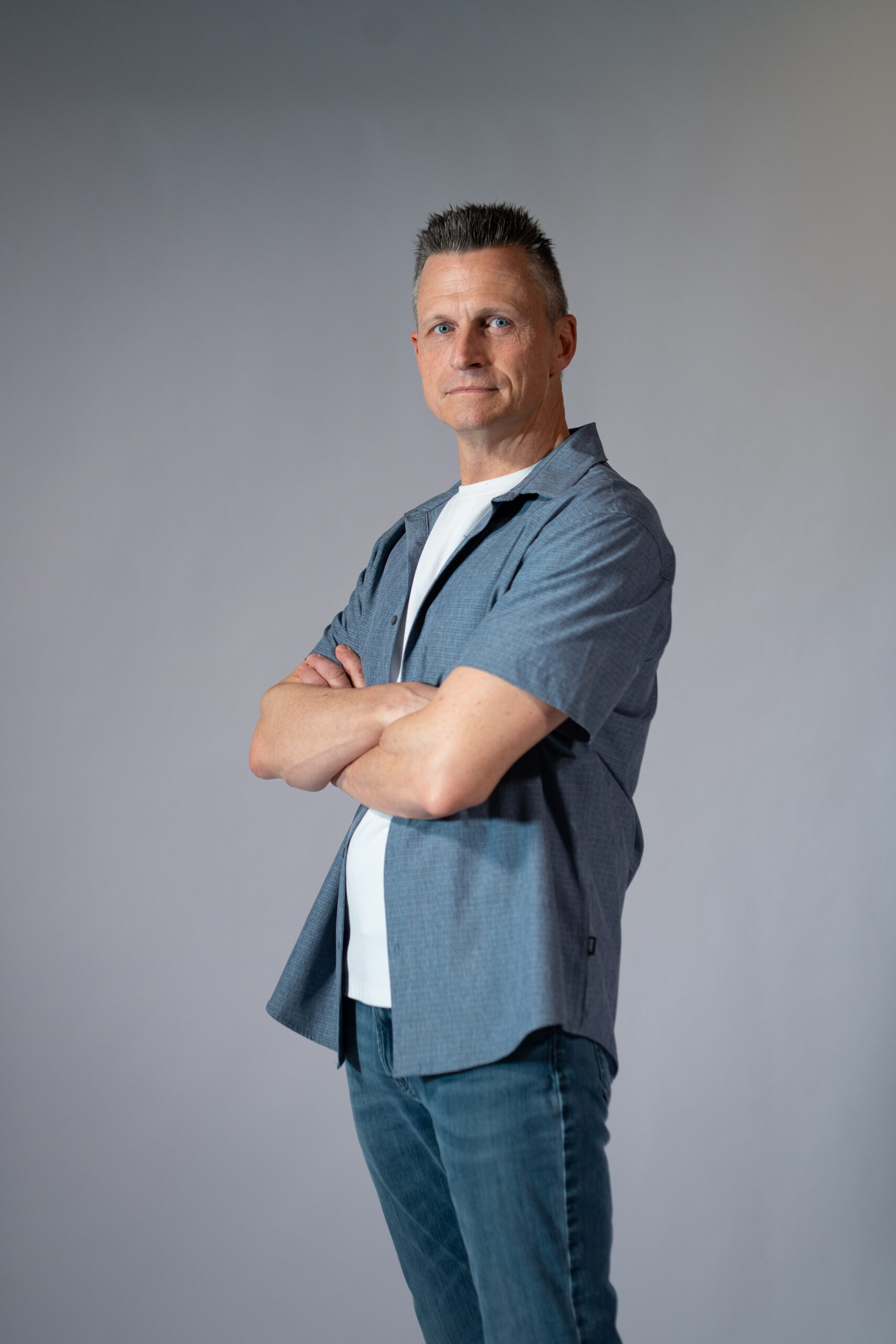 Mark Riley arms crossed